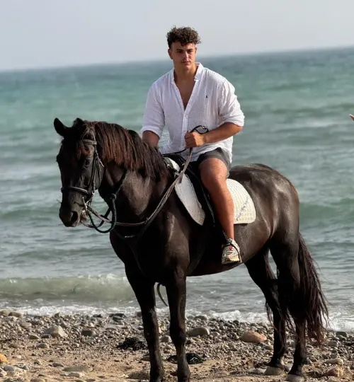 Morning horse ride along Taghazout’s Golden Beach with ocean views and soft sand